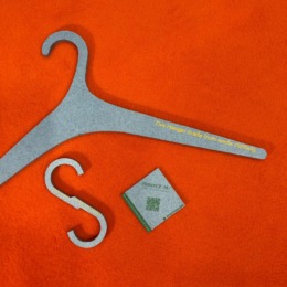 sustainable clothes hanger made from waste clothing